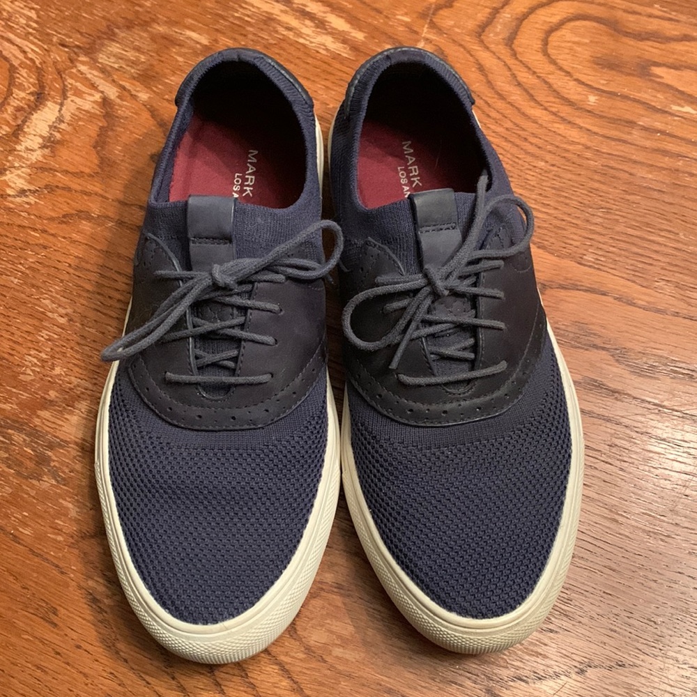 Navy blue slip on shoe with memory foam.